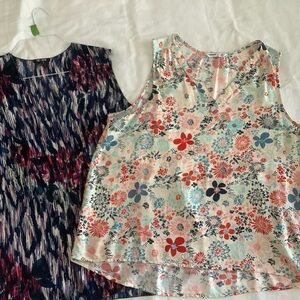 Bundle of 2 flowy sleeveless tops.